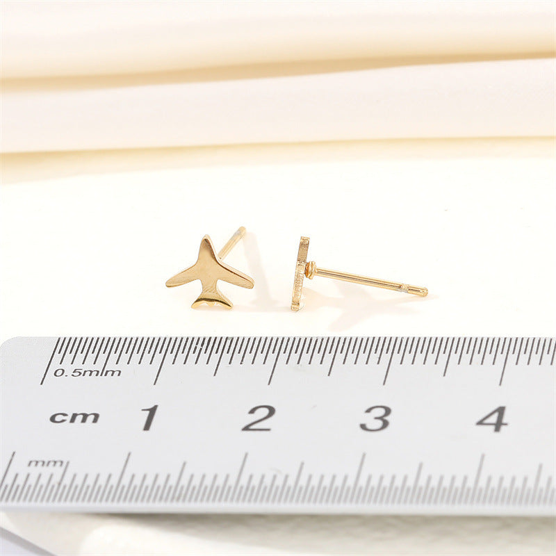 Simple and sweet little "ear" planes earrings