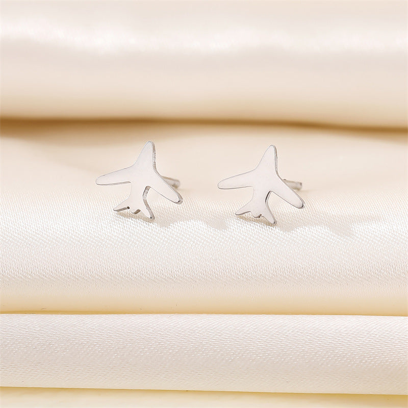 Simple and sweet little "ear" planes earrings